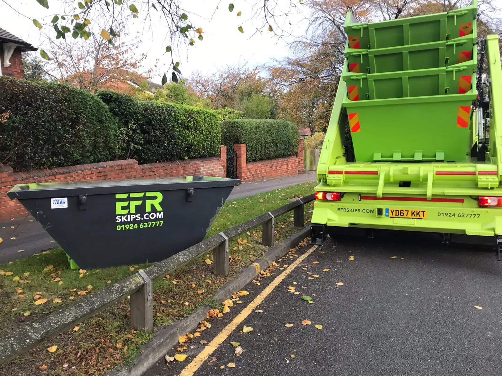 A skip delivered onto a residential driveway